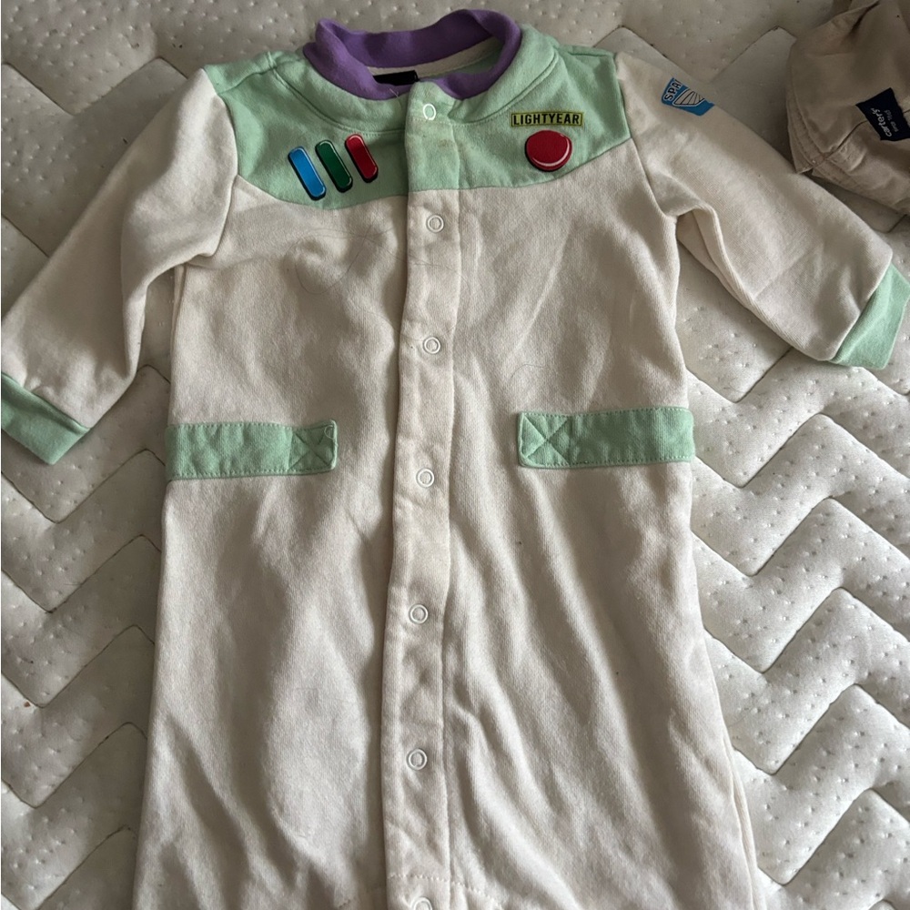 Disney Pixar Baby Onesie in Cream, Green, and Purple